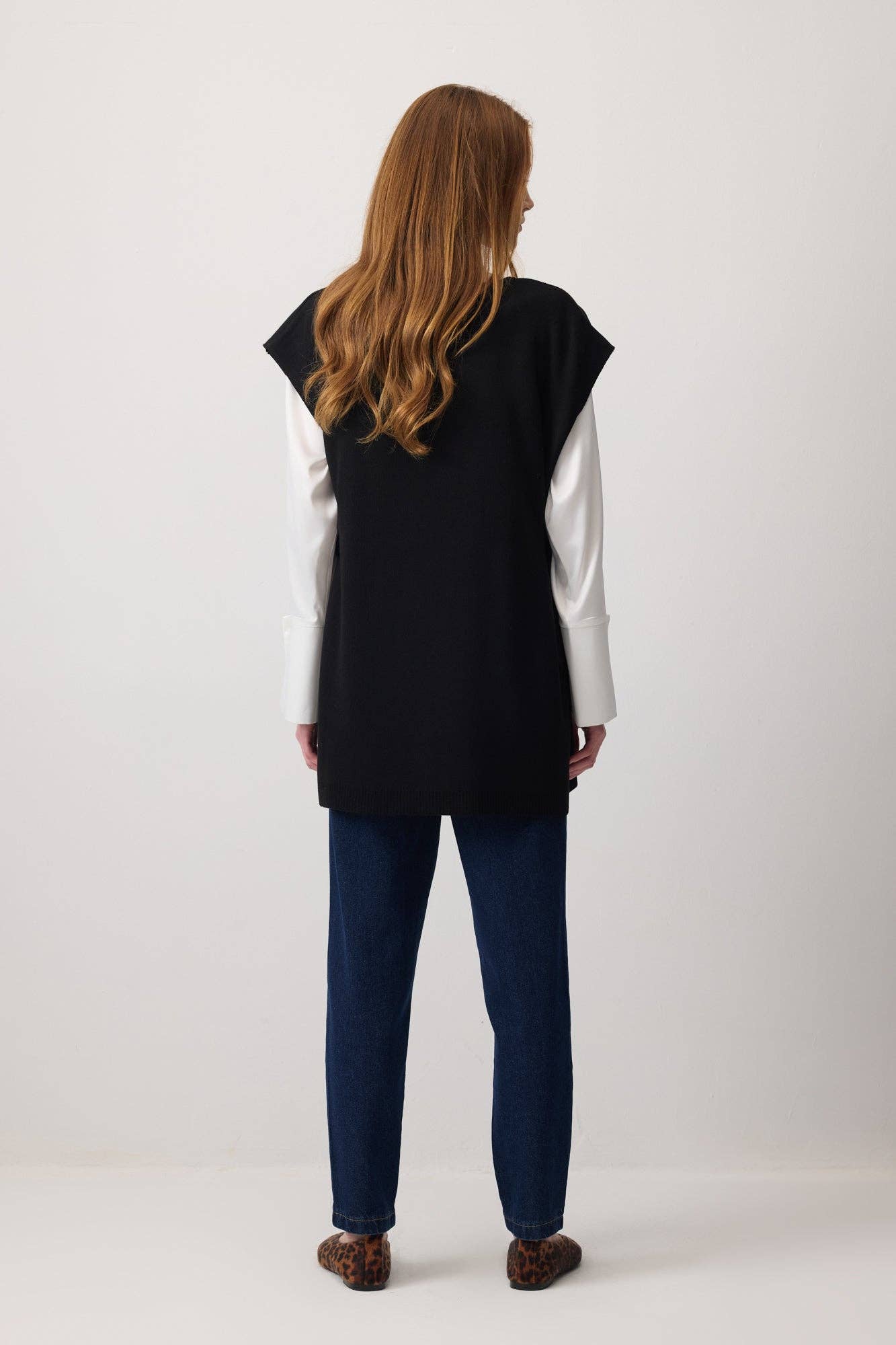 Gilet in maglia lungo con scollo a V e lacci laterali