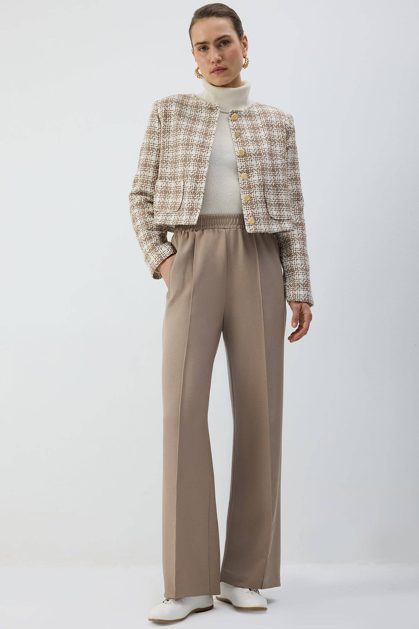 Pantaloni a pieghe con vita elasticizzata