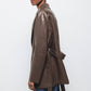 Cappotto in ecopelle con cintura