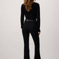 Pantaloni flare in denim elasticizzato nero