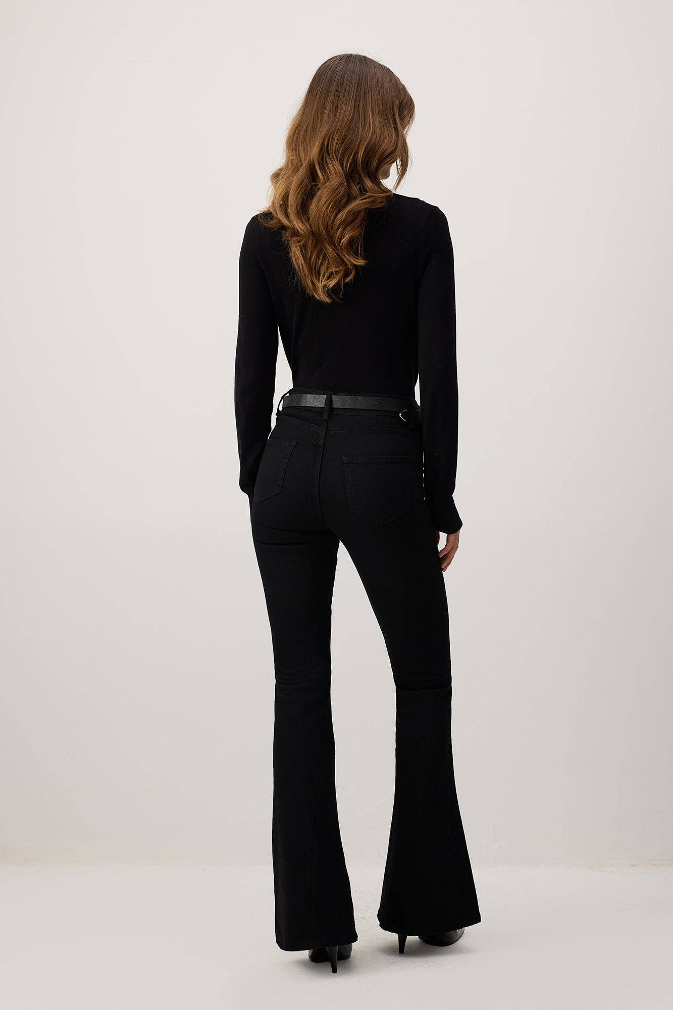 Pantaloni flare in denim elasticizzato nero