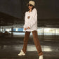 Cappello a secchiello beige con ricamo tigre