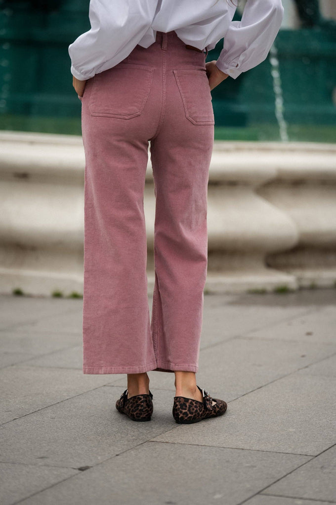 Pantaloni cropped in velluto a coste rosa