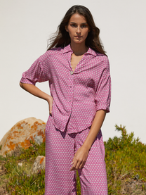 Pantaloni palazzo stampati rosa in viscosa