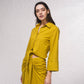 Blusa con nodo frontale e colletto a camicia