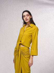 Blusa con nodo frontale e colletto a camicia
