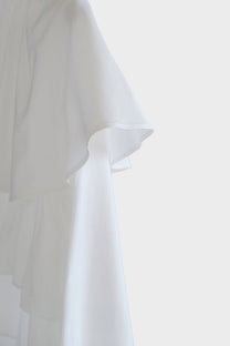 Blusa corta con balze e maniche a sbuffo in misto cotone