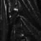 Trench coat effetto pelle nero lucido