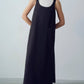 Abito salopette nero con spalline strutturate