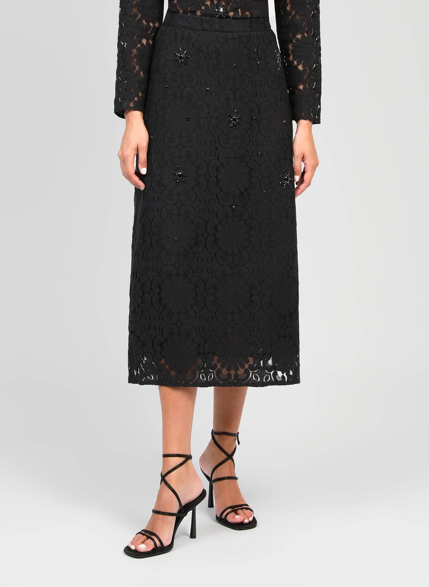 Gonna midi in pizzo nero con ricami di strass e perle