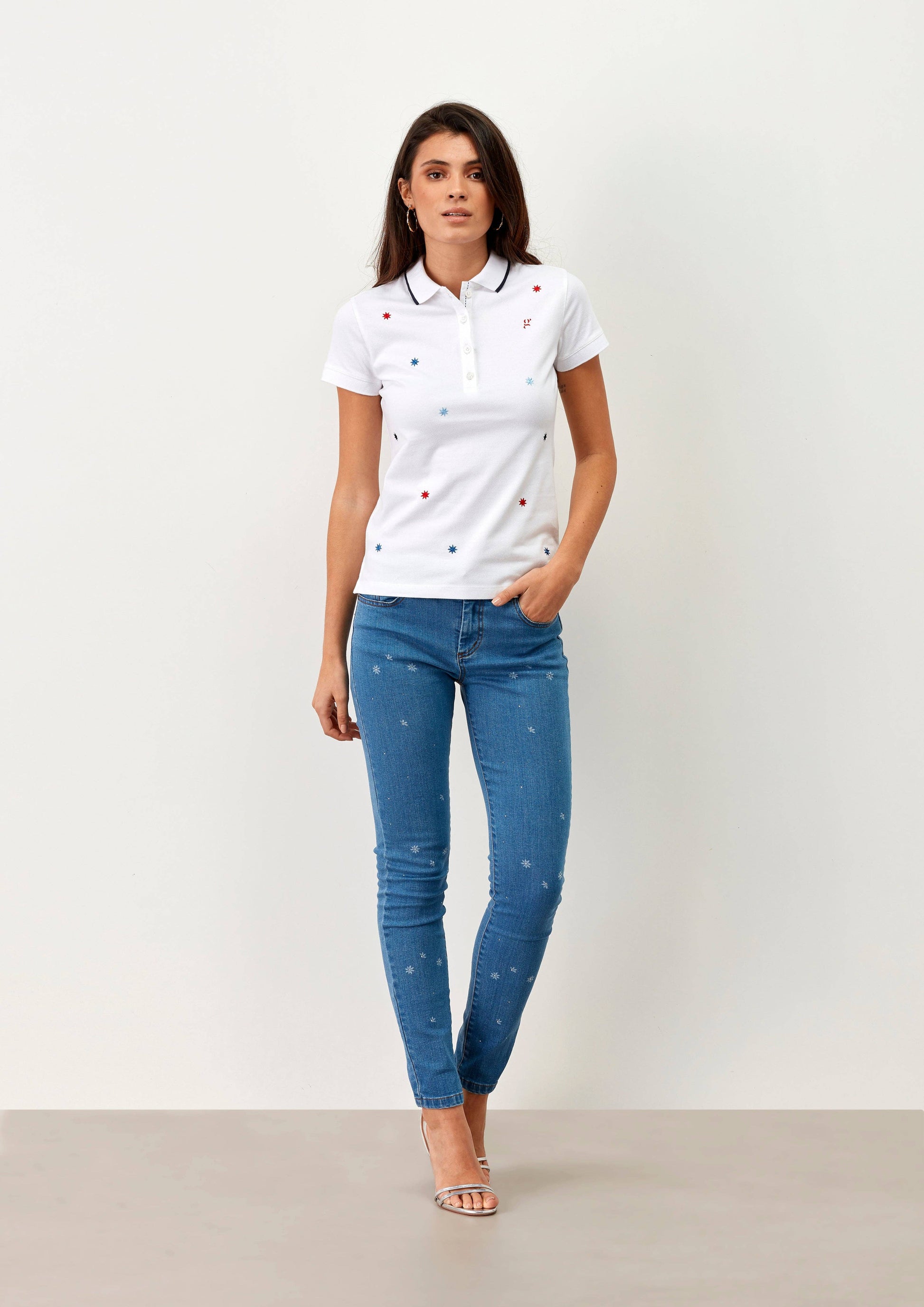 Polo donna in cotone con ricami a stelline