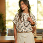 Blusa con stampa geometrica
