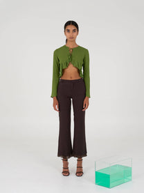 Blusa corta verde con fiocchi e volant