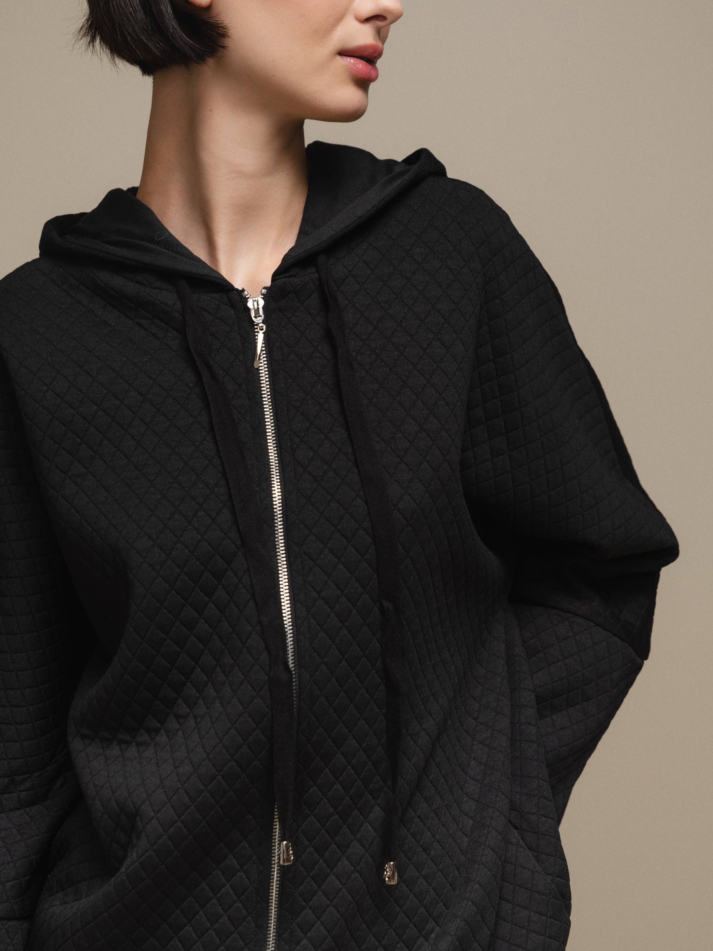 Cappotto donna trapuntato con cappuccio e zip