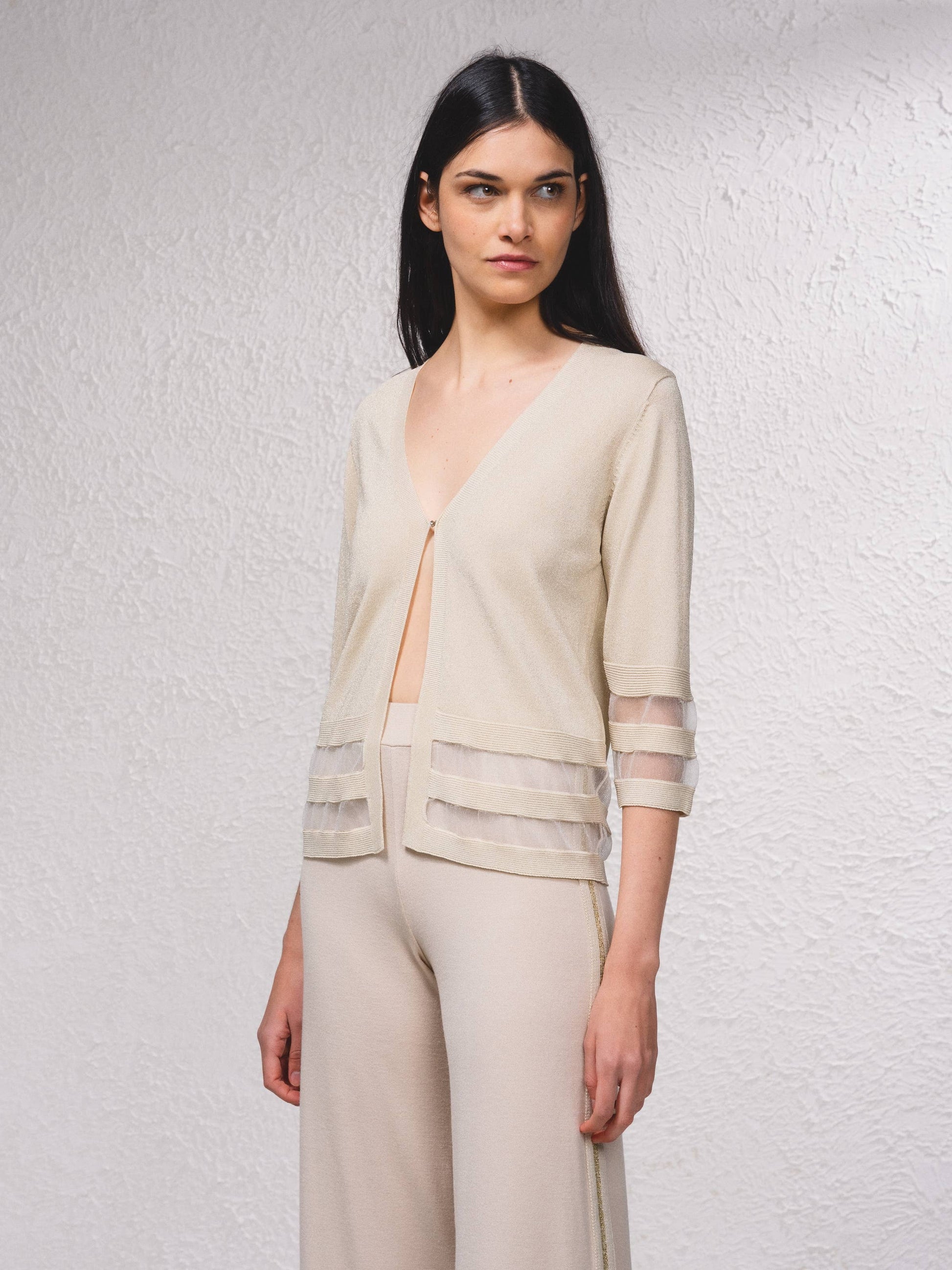 Giacca corta in maglia lurex con trasparenze