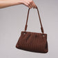 Borsa a tracolla intrecciata con chiusura magnetica