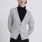 Cardigan in maglia traforata con bottoni
