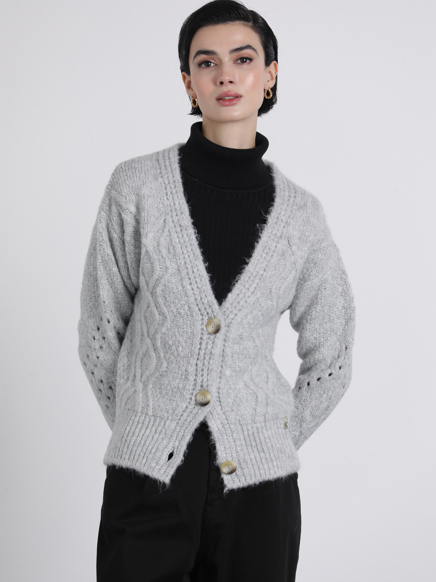 Cardigan in maglia traforata con bottoni