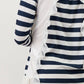 Maglia a righe con volant e cut-out sul retro
