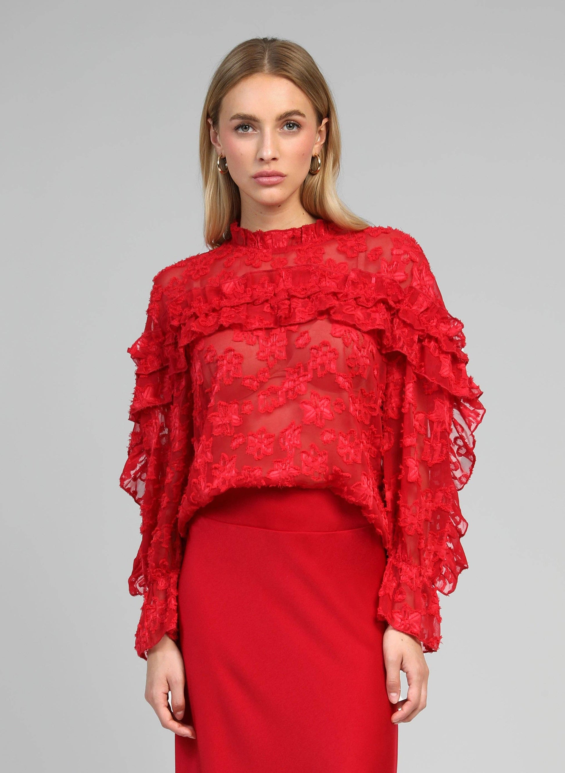 Blusa Soely rossa trasparente jacquard con volant