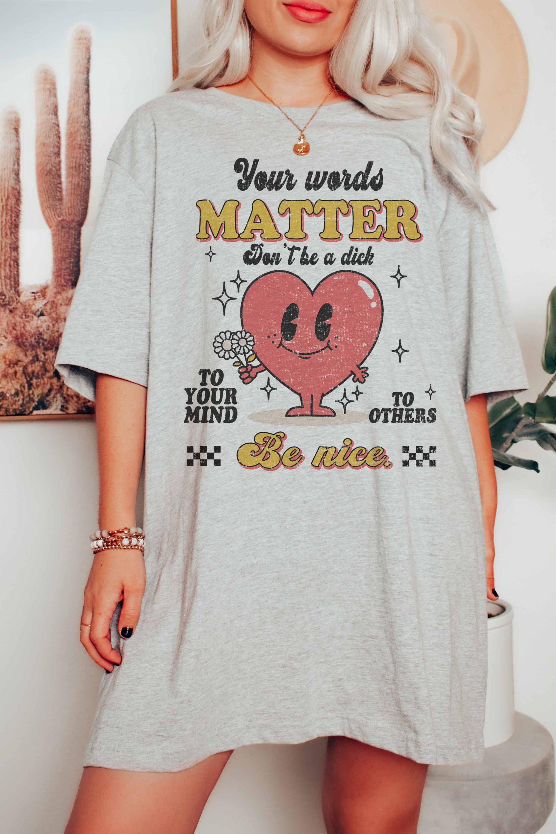 T-shirt grafica "Be Nice"