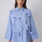 Camicia oversize in popeline di cotone a righe con fiocchi decorativi