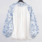Blusa floreale con maniche a sbuffo