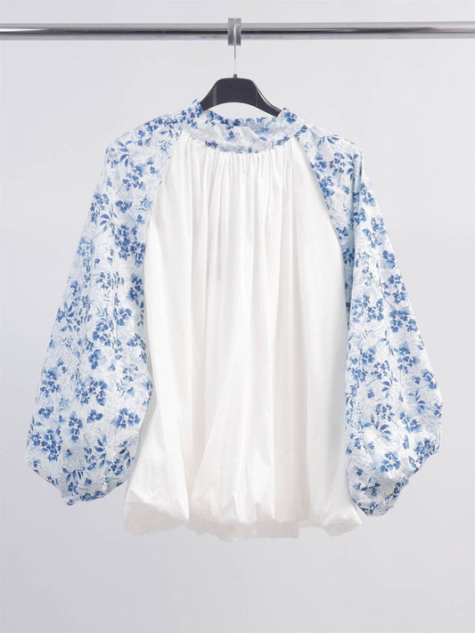 Blusa floreale con maniche a sbuffo