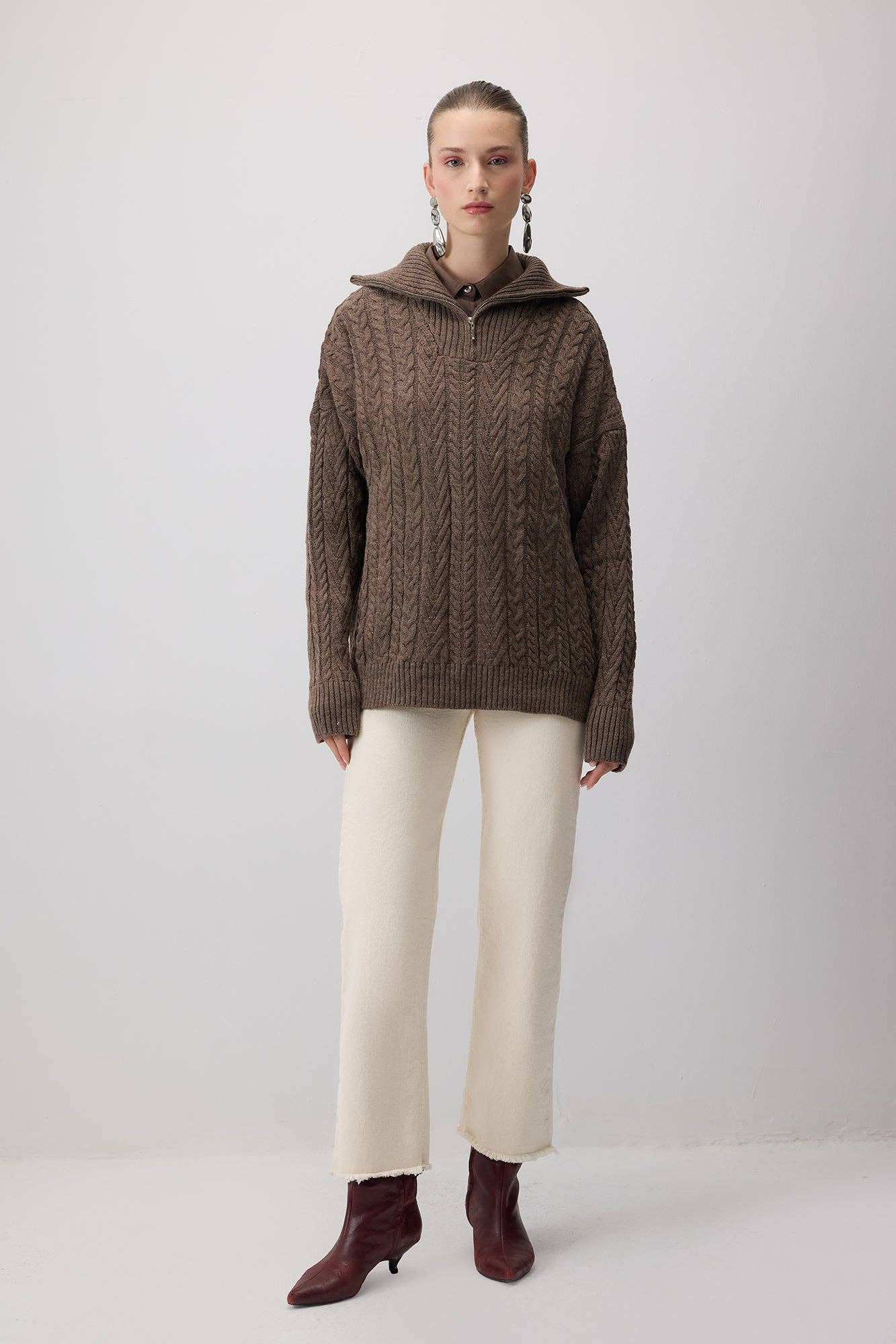 Maglione in maglia a trecce con zip e colletto ampio
