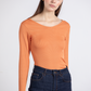 Maglia a costine arancione con scollo a V