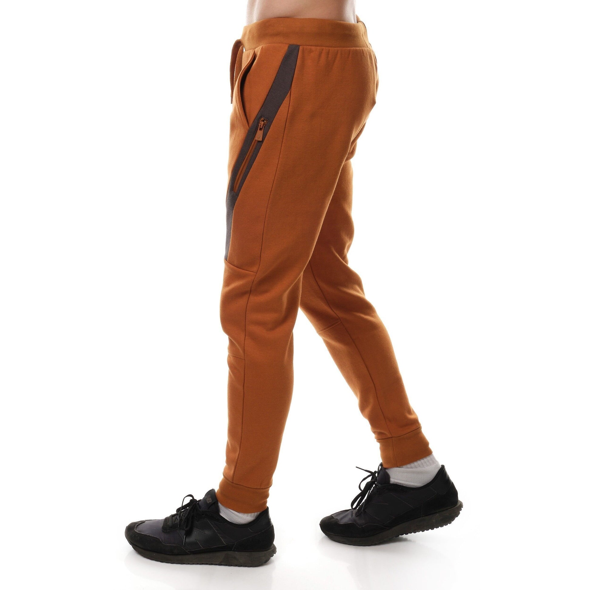 Pantaloni jogging in pile beige da uomo con tasche zip