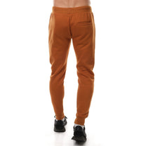 Pantaloni jogging in pile beige da uomo con tasche zip