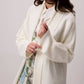 Cardigan lungo in maglia panna