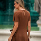 Abito midi in maglia con fiocchi laterali