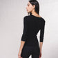 Cardigan in maglia a coste con catene dorate