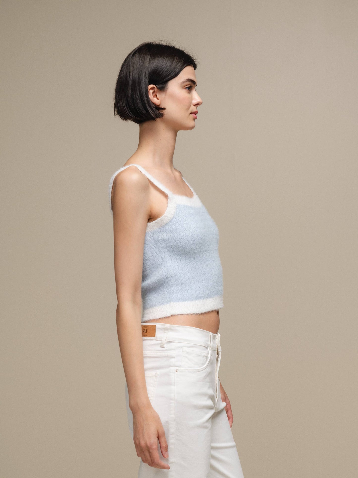 Top in maglia effetto fluffy bicolore