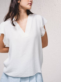 Blusa fluida con scollo a V e maniche arricciate