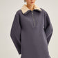 Felpa oversize con collo in pelliccia sintetica e mezza zip