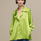 Tunica satinata oversize con bottoni