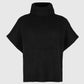 Pull oversize nero stile poncho con collo alto