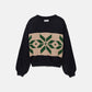 Maglione jacquard con maniche a palloncino