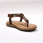 Sandali bassi infradito con stampa leopardata e dettagli metallici