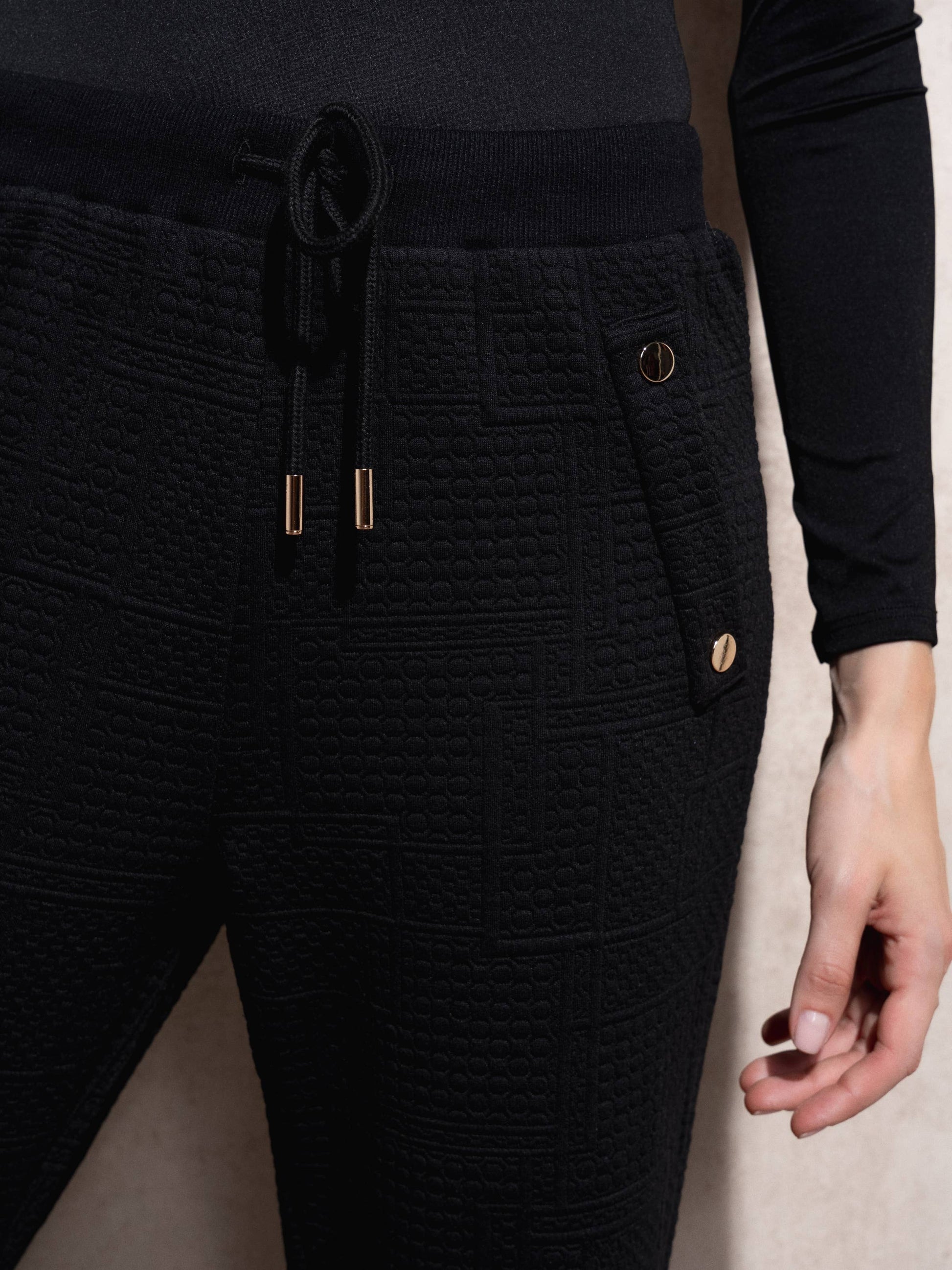 Pantaloni jogger in tessuto matelassé con coulisse