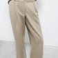 Pantaloni a pieghe con vita elasticizzata