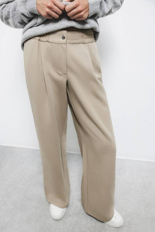 Pantaloni a pieghe con vita elasticizzata
