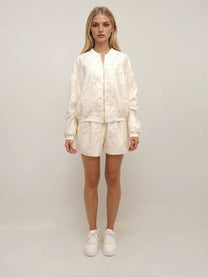 Shorts in raso con ricamo floreale