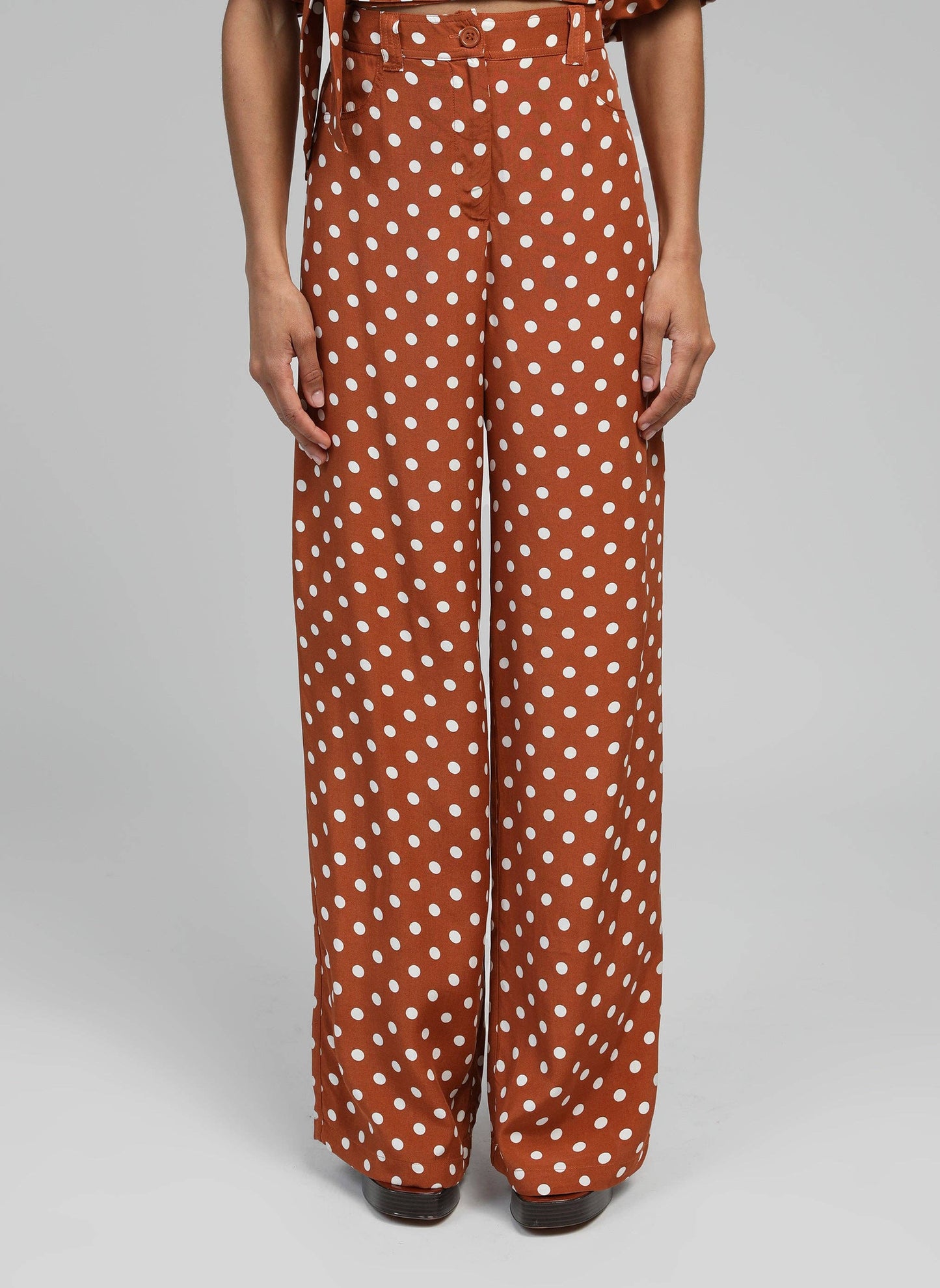 Pantaloni flare a pois caramello a vita alta