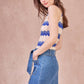 Top in maglia senza maniche a righe zigzag