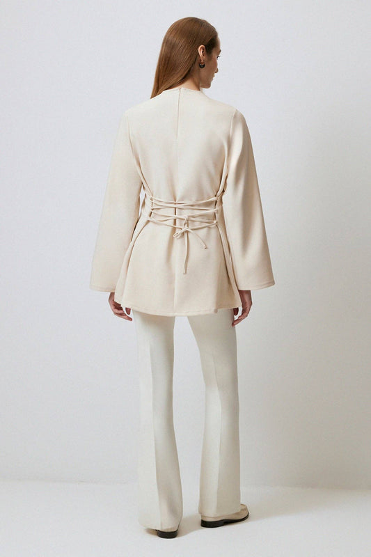 Blusa in crêpe con dettaglio incrociato color crema