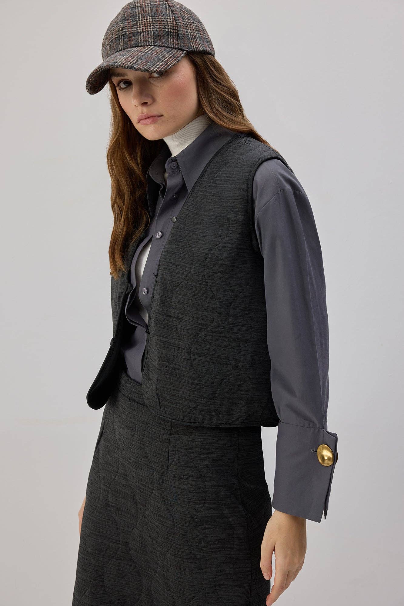 Completo donna con gilet trapuntato e gonna lunga